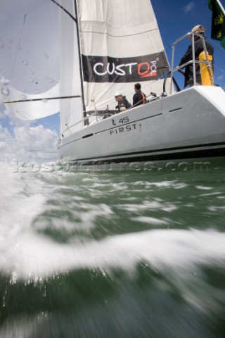 Above and below the water surface as a yacht rounds the windward mark on Day 5 of the Rolex Commodor