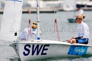 Qingdao, China, 20080807: 2008 OLYMPICS - Practice Race at Olympic Sailing Regatta before the real deal begins on Saturday. Therese Torgersson/Vendala Santen (SWE) - 470 Class women.  (No sale to Denmark)