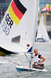 Qingdao, China, 20080807: 2008 OLYMPICS - Practice Race at Olympic Sailing Regatta before the real deal begins on Saturday. Petra Niemann (GER) - Laser Radial Class.  (No sale to Denmark)