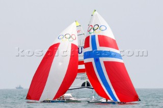 Qingdao, China, 20080807: 2008 OLYMPICS - Practice Race at Olympic Sailing Regatta before the real deal begins on Saturday. 49er Class.  (No sale to Denmark)