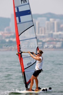 Qingdao, China, 20080807: 2008 OLYMPICS - Practice Race at Olympic Sailing Regatta before the real deal begins on Saturday. Tuuli Petaja (FIN) - RS:X Class Women.  (No sale to Denmark)