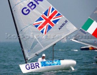 Qingdao, China, 20080809: 2008 OLYMPICS - first day of racing in the Olympic Sailing Event. Ben Ainslie (GBR) - Finn Class.  (no sale to Denmark)