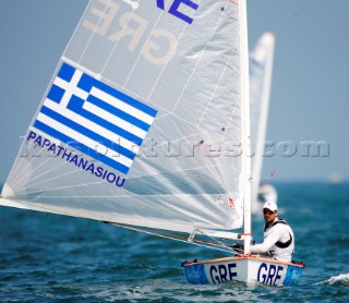 Qingdao, China, 20080810: 2008 OLYMPICS - second day of racing in the Olympic Sailing Event. Haris Papathanasiou (GRE) - Finn Class.   (no sale to Denmark)