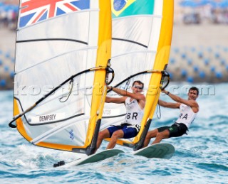 Qingdao, China, 20080811: 2008 OLYMPICS - third day of racing in the Olympic Sailing Event. Nick Dempsey (GBR) and Ricardo Santos (BRA) -  RS:X Class.  (no sale to Denmark)