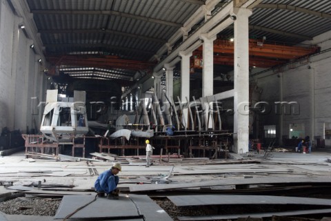 Yacht builders and skilled workers boatbuilding at the Cheoy Lee shipyard and boatbuilders in China 