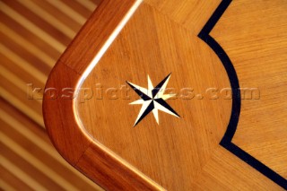 Wooden inlaid table detail on superyacht during boatbuilding at the Jet tern shipyard and boatbuilders in China