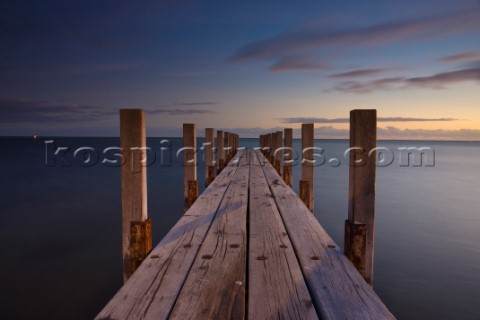 Dusk over a wooden jetty