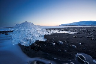 Large chunks of ice regularly wash up on the volcanic southern shoreline of Iceland