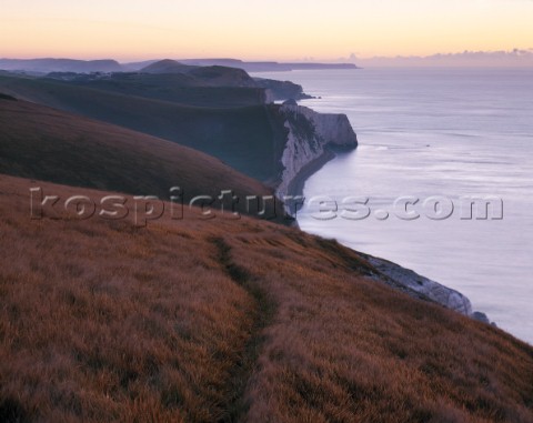 Dawn arrives on the Jurassic Heritage Coast of Dorset Viewed from this clifftop the steeply undulati