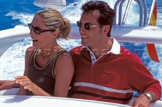 Couple onboard motor boat
