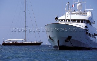 Cruising French registered superyacht and maxi sailing yacht at anchor in a quiet anchorage mooring