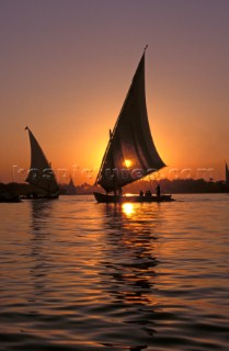 Two Feluccas on the river Nile at sunset, Luxor, Egypt