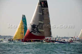 PORTSMOUTH, UNITED KINGDOM - JUNE 2: A large spectator fleet join the Volvo 70 yachts as Pirates of the Caribbean and ABN Amro Two are close tacking at the start. The Volvo fleet leave Portsmouth and sail through the Solent on Leg 8 of the Volvo Ocean Race 2005-2006 around the United Kingdom to Rotterdam, Holland. The overall event has already been won by Mike Sanderson on ABN AMRO ONE with two legs remaining.