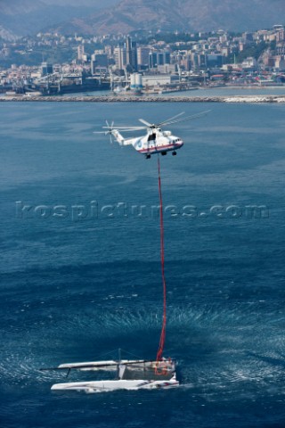 Russian helicopter lifts and transfers the multihull catamaran Alinghi 5 from Lake Geneva to Genoa o