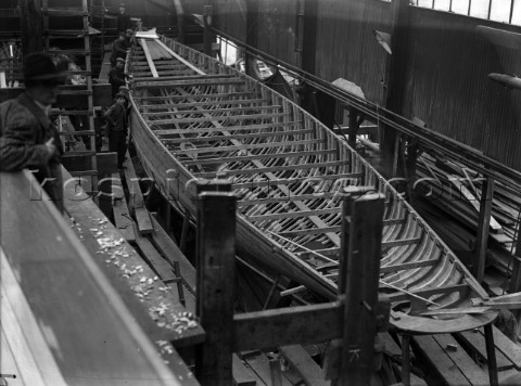 Large yacht being built in the building sheds at Nicholsons in Gosport in 1930