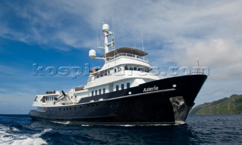 Cruising in Indonesia superyacht Asteria at anchor in Wagmab