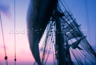 Four-masted barque Nippon Maru in a dawn breeze.