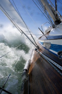 A 39 foot Nautor Swan sailboat, crashes through waves while sailing in heavy weather, on April 15, 2004, in the Pacific  Ocean, near San Francisco, California.