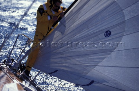Crew checking the Dacron sails onboard Swan 56