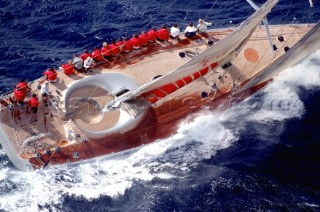 Aerial view of one off Maxi yacht Virtuelle with her crew sitting on the windward rail.  Maxi Yacht Cup 2000, Sardinia, Italy