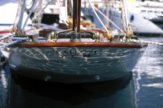 Water reflections on the transom of classic yacht Tuiga