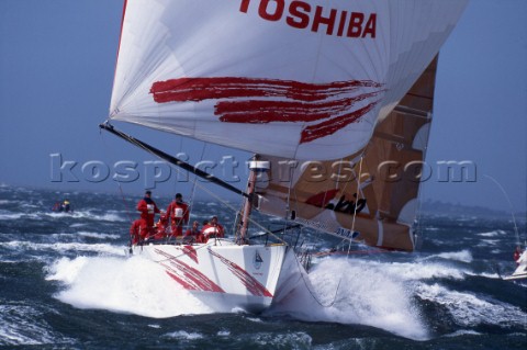 Whitbread 60 Toshiba surfing downwind under spinnaker