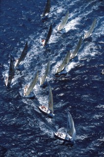 Fleet of Farr 40 racing yachts approaching the windward mark
