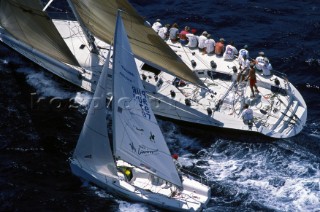 A maxi yacht and a Melges 24 racing in St Thomas, US Virgin Islands