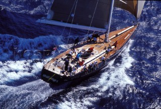 Fleet of Farr 40s racing passed a tanker in the Solent, UK during the 2001 Farr 40 World Championship