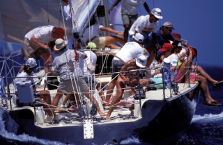 View of crew in cockpit of racing yacht