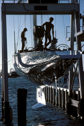 Lifting an americas cup boat out of the water