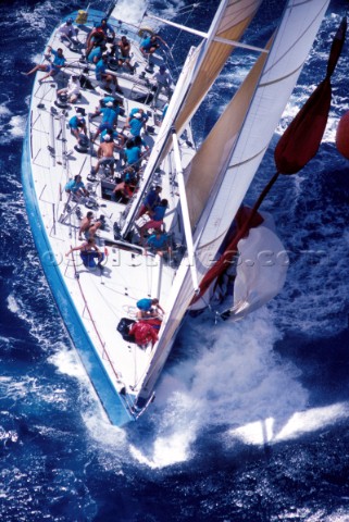 Aerial view of crew working onboard a maxi racing yacht