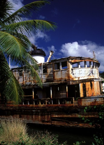 Rusty wreck of an old river boat Caribbean