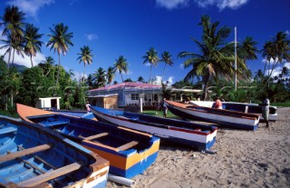 Small fishing boats on sandy beach - Nevis, Caribbean