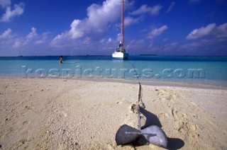 Anchor on sandy beach, Maldives