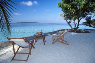 Ranveli Resort Maldives Deck chairs on the beach, Ranveli Resort, Maldives