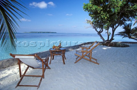 Ranveli Resort Maldives Deck chairs on the beach Ranveli Resort Maldives