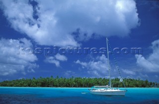 Cruising yacht at anchor - Tahiti