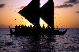 Two traditional boats at sunset, Hokulea, Hawaii