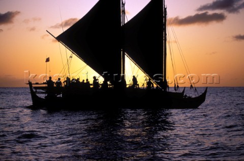 Two traditional boats at sunset Hokulea Hawaii
