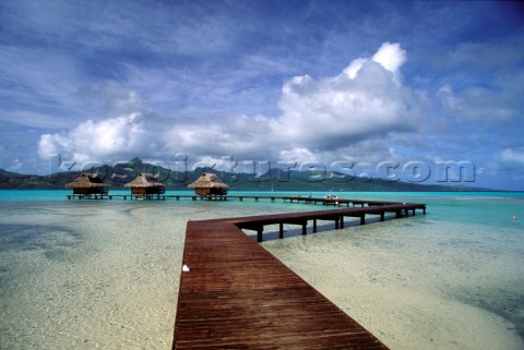 Water villas and pontoon on Bora Bora  French Polynesia