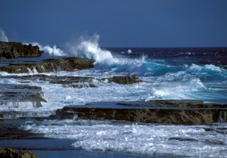 Sea crashing against rocks, Tonga