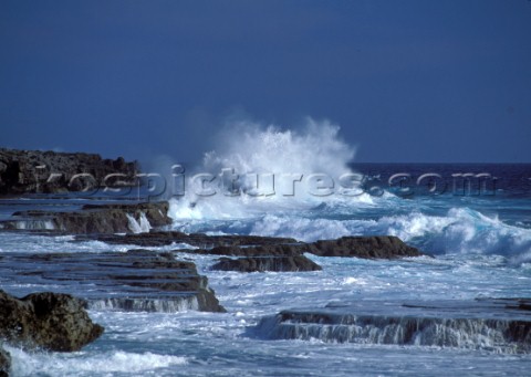 Sea crashing against rocks Tonga
