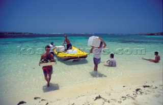 Provisiona arriving by boat - Seychelles
