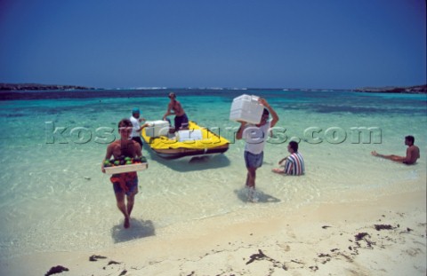 Provisiona arriving by boat  Seychelles