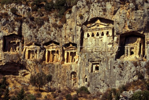 Ancient dwellings and temples in the cliff face Aegean Coast Turkey