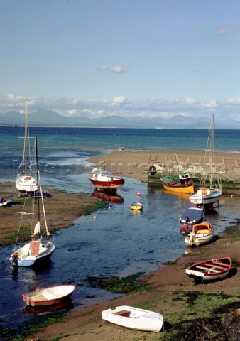 Boats aground on the mud at low tide