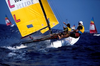 Crew hiking out on a Hobie Cat dinghy during the World Championship in Mexico 1989