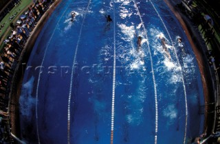 Wide angle aerial view of a race in a swimming pool