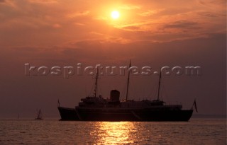 The Royal Yacht Britannia moored at sunset